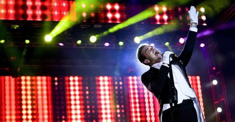  O Gigante do Rock: Uma Noite Inesquecível com Robbie Williams em Lisboa!